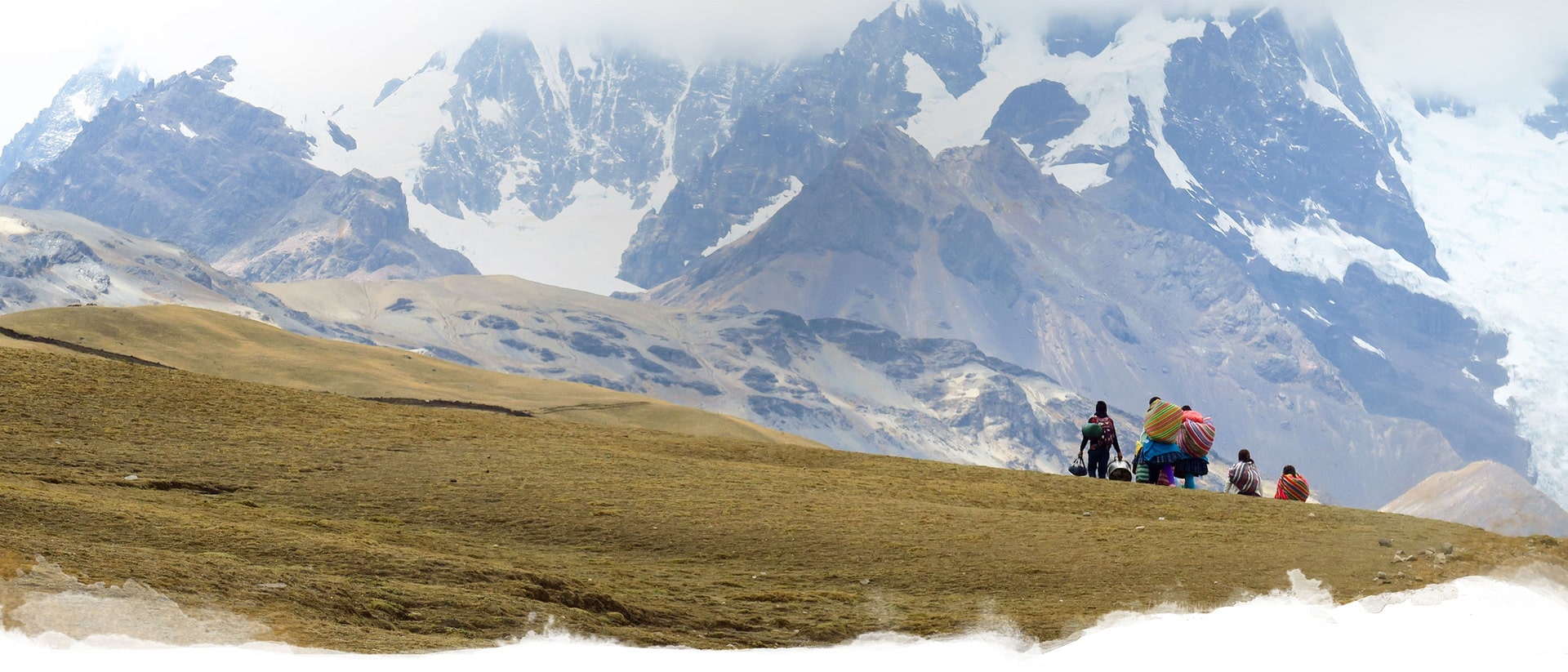 A Summer Travel Group Hiking In The Andes Mountains